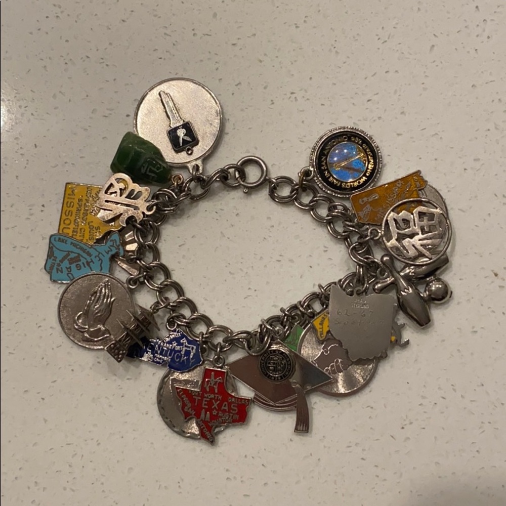 Vintage Sterling Silver with 22 charms bracelet